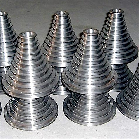 Restored and repaired metal step cones organized in stacks